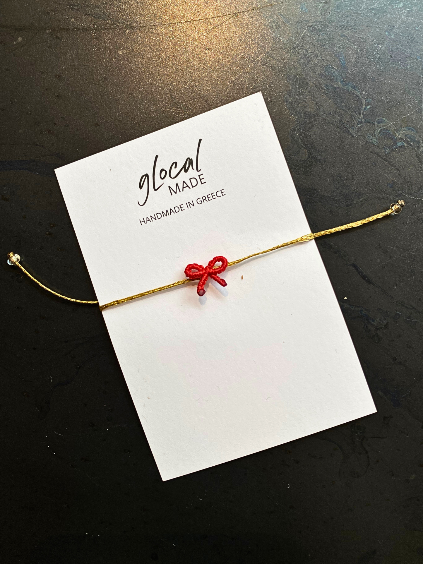 GlocalMade Armband Schleife