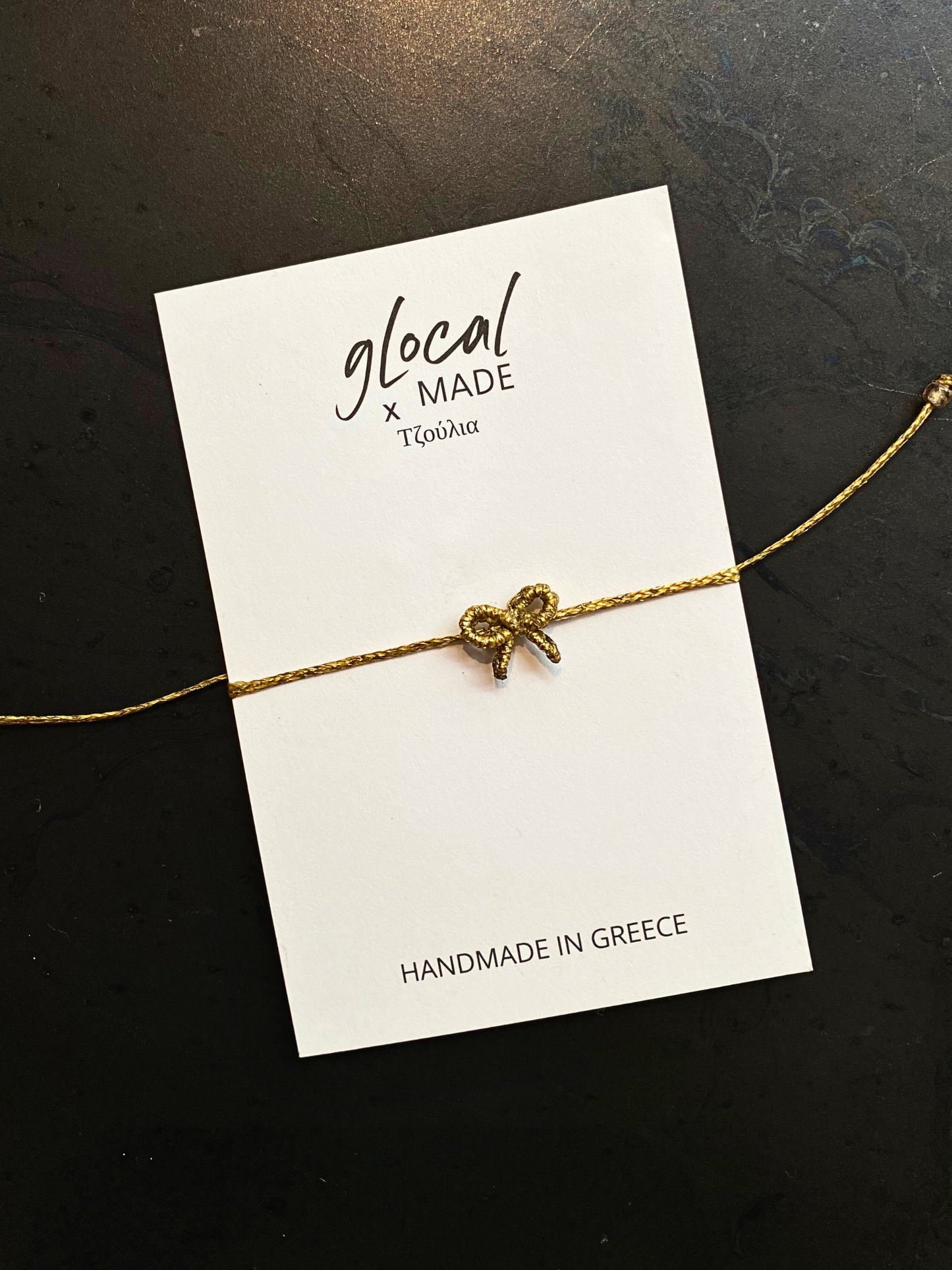 GlocalMade Armband Schleife