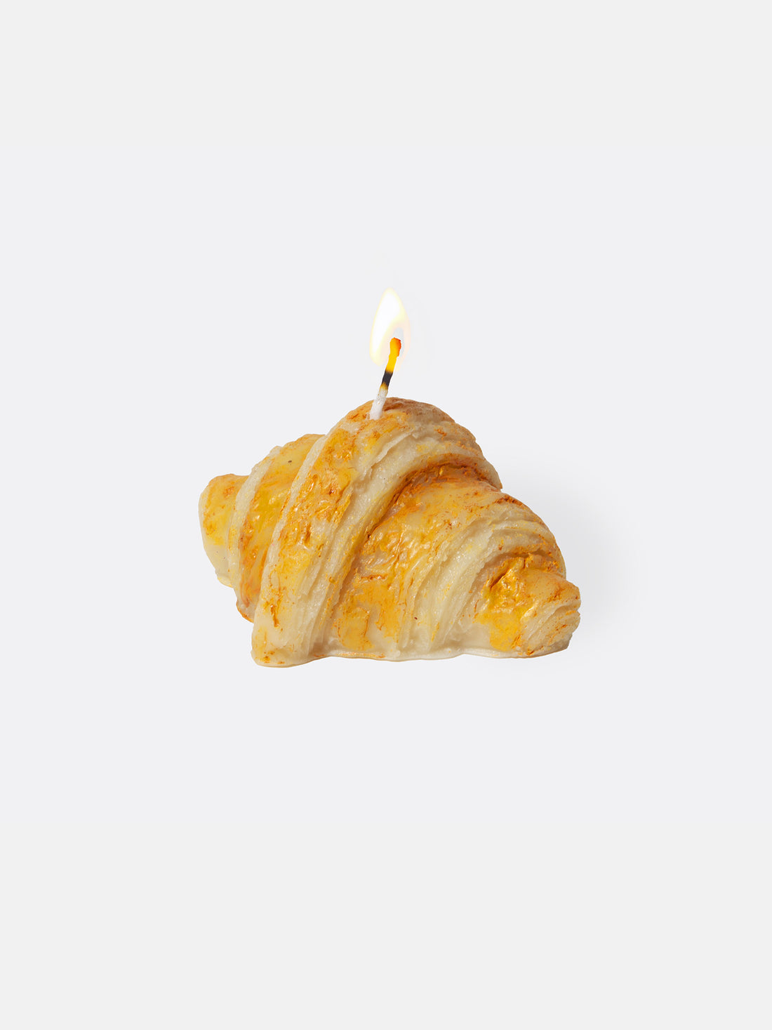 DOIY Duftkerze Croissant „Good Morning“ in Form eines Croissants, ideal für gemütliche Morgenstunden.